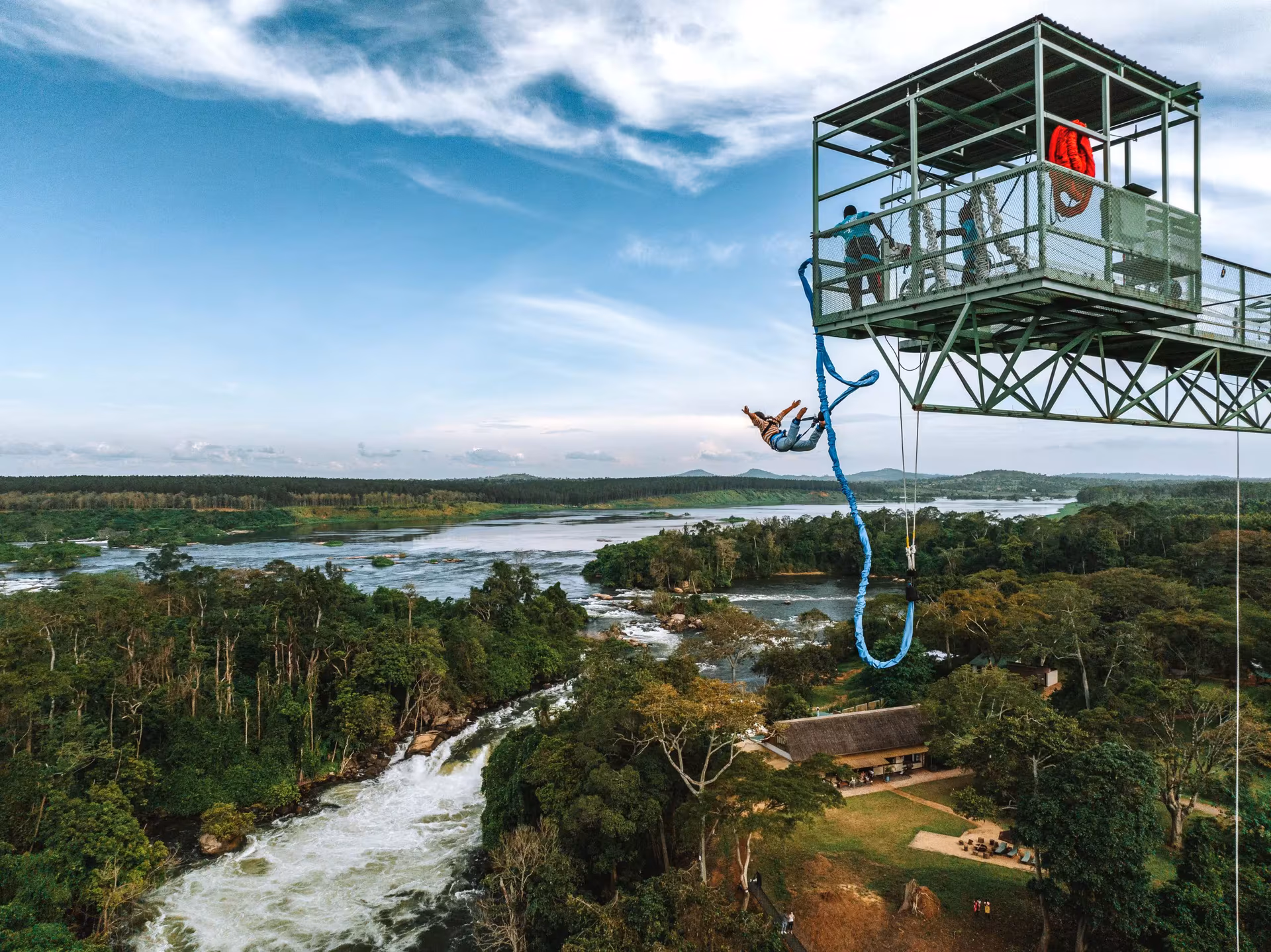 Person bungee jumping 44 meters above the River Nile at Adrift Adventure Company, Jinja
